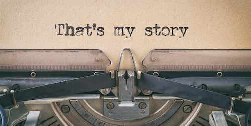 Close-up of a vintage typewriter typing the phrase ’That's my story’ on a sheet of paper.